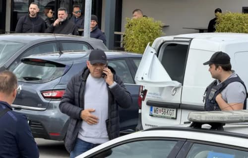 (FOTO) Drama na Mercatorjevem parkirišču: Pred številnimi gosti lokala skušal ukrasti denar iz avta varnostne službe