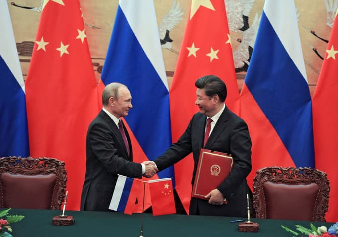 Ruski predsednik Vladimir Putin in njegov kitajski kolega Ši Džinping