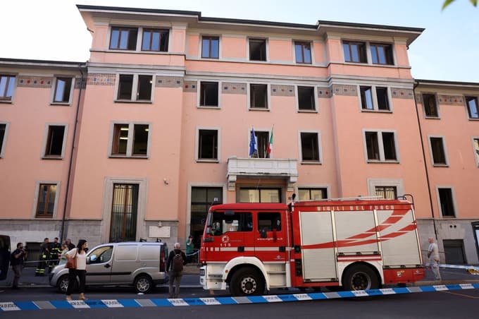 Firefighters work at the scene following a fire in a retirement home in Milan, Italy, July 7, 2023. REUTERS/Claudia Greco   TPX IMAGES OF THE DAY