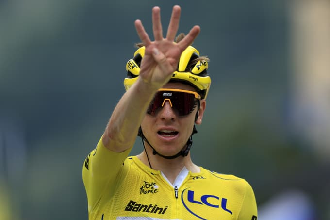 epa11487868 Yellow jersey Slovenian rider Tadej Pogacar of UAE Team Emirates celebrates as he crosses the finish line to win the 19th stage of the 2024 Tour de France cycling race over 144km from Embrun to Isola 2000, France, 19 July 2024. EPA/GUILLAUME HORCAJUELO