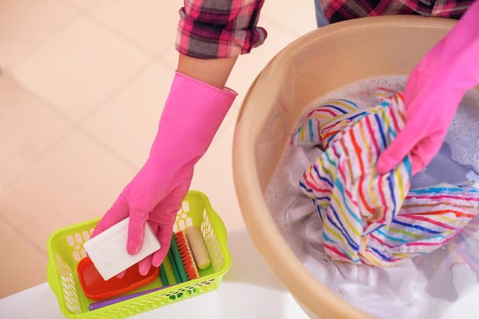 Women's hands wash clothes with soap. Close-up.,Image: 376490383, License: Royalty-free, Restrictions:, Model Release: no