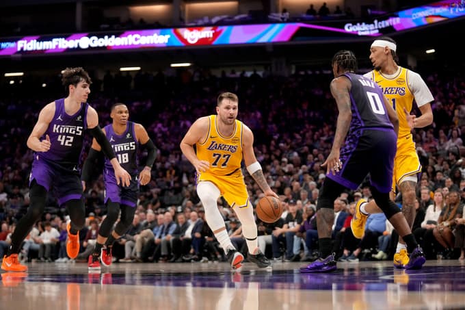 Jan 12, 2026; Sacramento, California, USA; Los Angeles Lakers guard Luka Doncic (77) dribbles the ball against the Sacramento Kings in the second quarter at the Golden 1 Center. Mandatory Credit: Cary Edmondson-Imagn Images