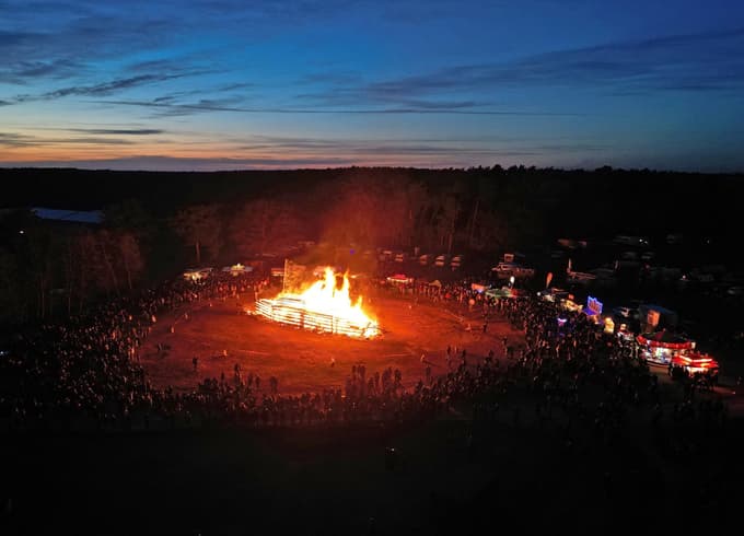 Logs arranged to resemble the Titanic ship stand in flames as people attend the traditional Easter bonfire in Trechwitz, Germany, April 4, 2026. REUTERS/Lisi Niesner