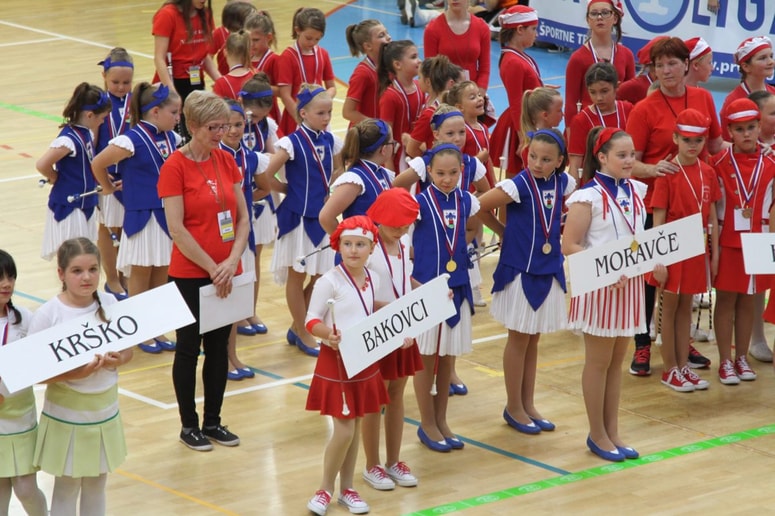 Domačinke bodo tekmovale v soboto, ob sedemnajsti uri v kategoriji junior skupina, v nedeljo ob deseti uri v kategoriji Prvi korak in ob petnajsti uri, ko bo tudi vrhunec tekmovanja – tekmovanje skupin.