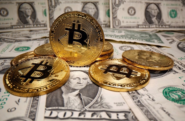 Glavna fotografija članka:Številni so to pričakovali že več tednov: Vrednost Bitcoina presegla 20.000 dolarjev