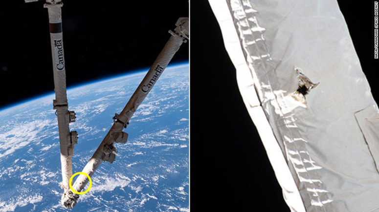 Satelitska roka in luknja v njej 