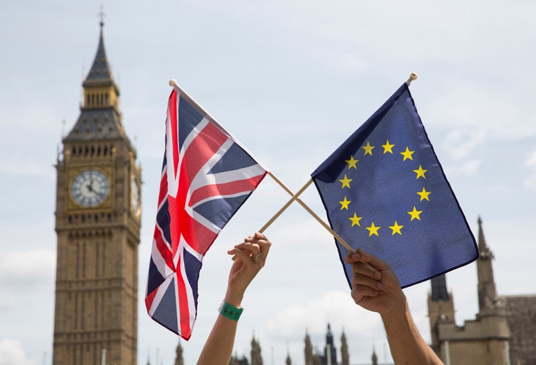 epa08902648 (FILE) Members of the public hold flags at a stay in, pro EU Referendum event in Parliament Square, Central London, Britain, 19 June 2016 (reissued 24 December 2020). A historic deal on the UK's future trading and security relationship with the European Union has been agreed upon 24 December 2020, a week before the end of the Brexit transition period. EPA/HAYOUNG JEON *** Local Caption *** 52837991 