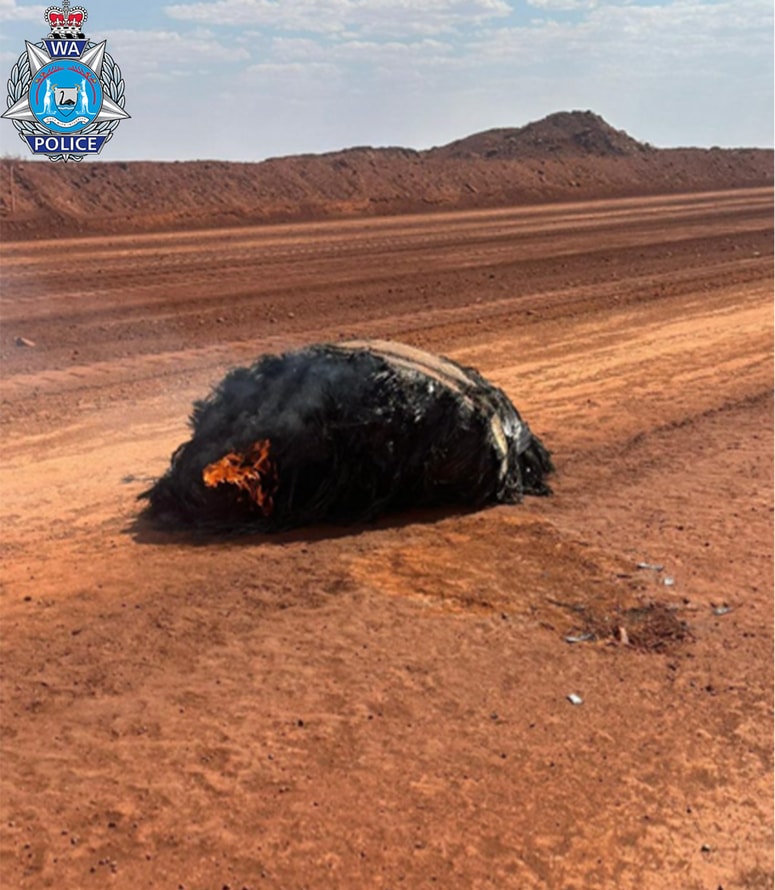 Predmet, ki je padel na makadamsko cesto pri kraju Newman.